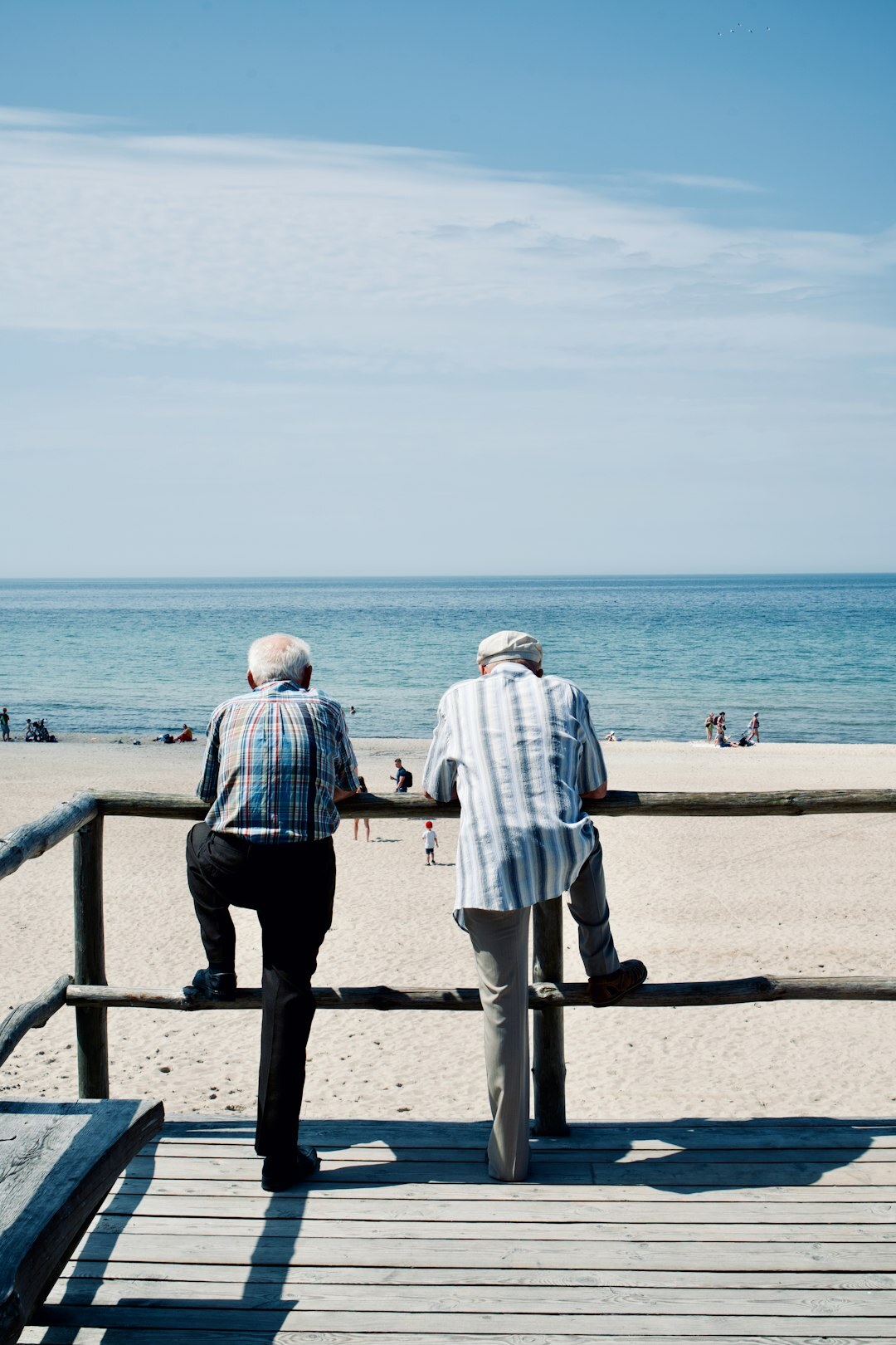 Elderly Danish couple walking along a coastal path